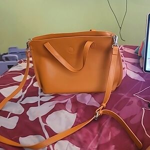 Brown purse with removable pouch